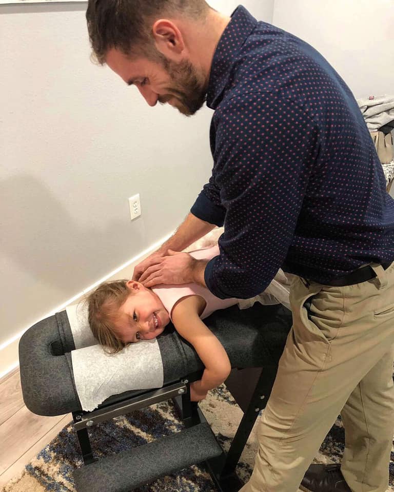 Doctor Gabriel Waterman providing children with expert chiropractic care